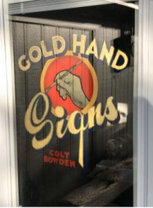 Gold-hand-signs signage