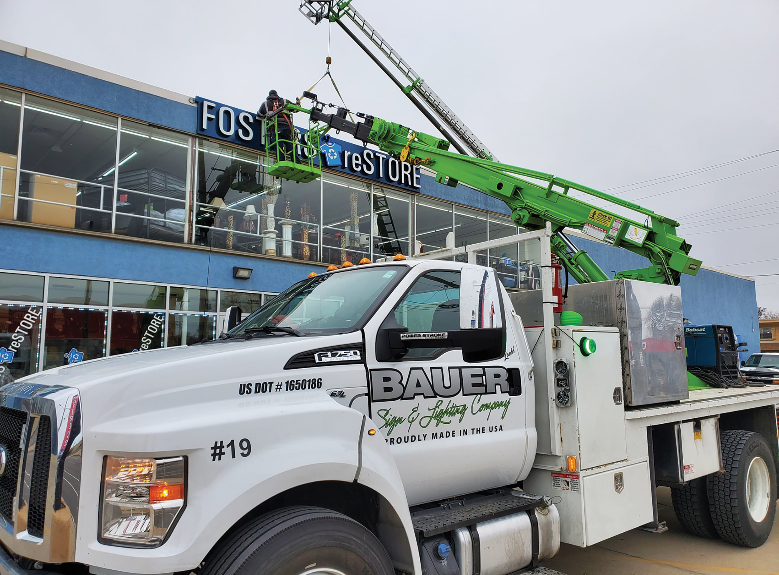 Installing this second-story sign was easy with Bauer Sign's crane and bucket trucks combo.