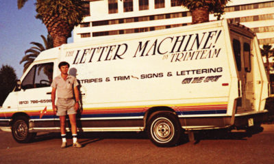 Larry Mitchell’s Winnebago cargo utility van — the Sprinter of that era — equipped with shelving for 15-in.-width rolls of vinyl and a Gerber Signmaker IVB plotter with $250 per hard card font. “On the Spot!” lettering and stripes.