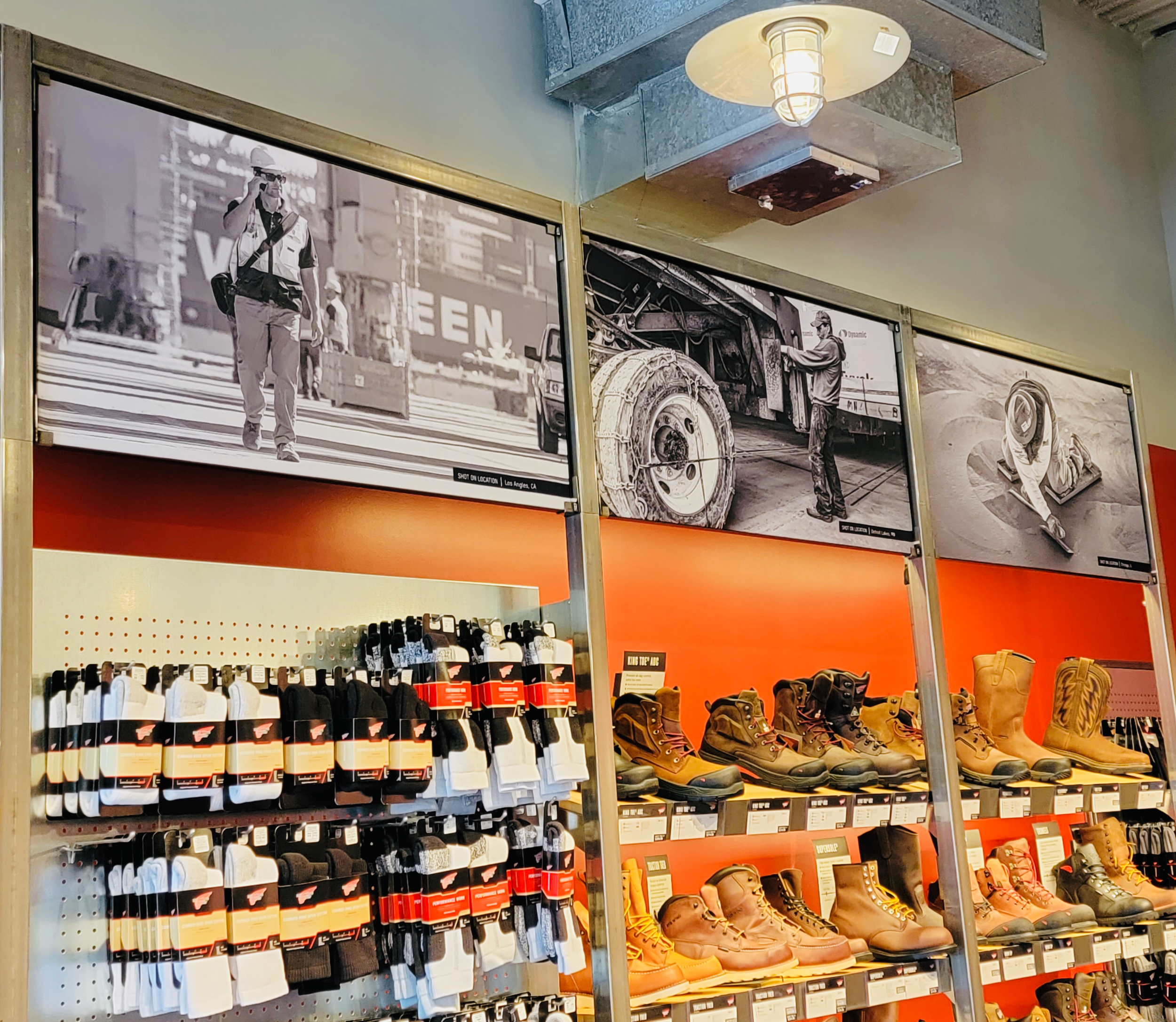 A SHOE-IN <br />Red Wing Shoes is trying on fabric signs to prevent glare from lighting.