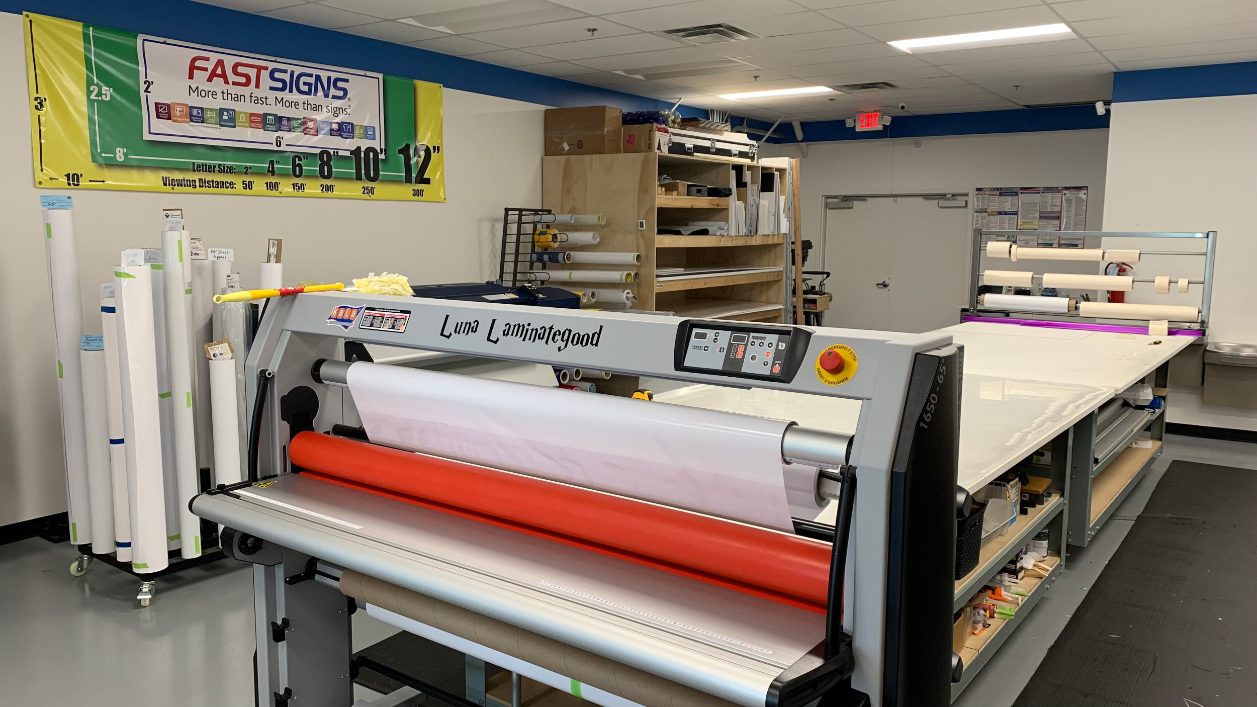 A look at the printing supplies and laminating equipment inside the shop.